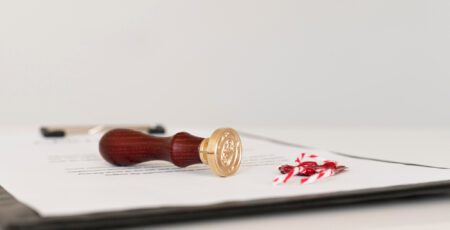 front view blurred certificate wax seal